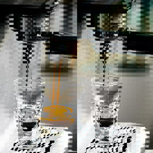 Commercial Espresso Machine Making Drink