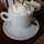 Whipped cream on drink in mug